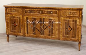 Handcrafted sideboard made of solid wood and richly inlaid in walnut and olive wood in neo-classical style